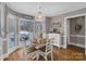 This breakfast nook features a coffee bar, and a door to the back deck at 10032 Hunters Trace Dr, Concord, NC 28027