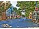 Charming street view in a town with quaint shops, lush trees, and a vintage atmosphere at 10032 Hunters Trace Dr, Concord, NC 28027