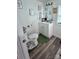 A cozy bathroom featuring a modern sink, toilet, and fun decorative touches at 102 Guffey Rd, Cherryville, NC 28021