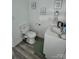 Neat bathroom with bidet, modern sink, and humorous wall art decor at 102 Guffey Rd, Cherryville, NC 28021