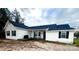Charming single-story home with white siding, black shutters, covered front porch and well-kept lawn at 102 Guffey Rd, Cherryville, NC 28021