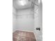 Walk-in closet featuring metal racks and carpet flooring at 11203 Chapeclane Rd, Charlotte, NC 28278