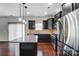 The kitchen features granite countertops, stainless steel appliances, and dark cabinets at 11203 Chapeclane Rd, Charlotte, NC 28278