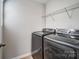 A convenient laundry room with modern Samsung washer and dryer at 11203 Chapeclane Rd, Charlotte, NC 28278