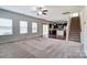 Open-concept living area seamlessly connects the living room, kitchen, and staircase at 11203 Chapeclane Rd, Charlotte, NC 28278