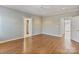 Bedroom with hardwood floors, neutral paint, a ceiling fan, and lots of natural light at 1131 S Kings Dr, Charlotte, NC 28207