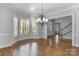 Bright, spacious living room featuring large windows and elegant trim at 1131 S Kings Dr, Charlotte, NC 28207