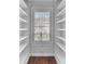 Room view with built in bookshelves surrounding the window at 1131 S Kings Dr, Charlotte, NC 28207