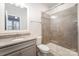 This bathroom offers a shower, granite vanity, and sink at 11679 Red Rust Ln, Charlotte, NC 28277