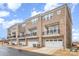 The exterior of these houses are brick with balconies above the garages at 11679 Red Rust Ln, Charlotte, NC 28277