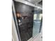Luxurious walk-in shower with tiled walls and convenient shelving at 117 Jones Rd, Shelby, NC 28150