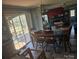 Bright dining area with wooden furniture, natural light, and a view of the outdoors at 117 Jones Rd, Shelby, NC 28150