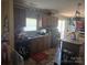 Practical kitchen layout featuring essential appliances, ample storage, and a cozy dining area at 117 Jones Rd, Shelby, NC 28150