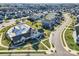 Aerial shot of the community clubhouse, playground, and pool amenities with lush landscaping at 120 Hornbeam Ln, Mooresville, NC 28117