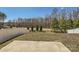 A well-maintained yard offers outdoor space with a concrete patio and privacy fence at 120 Hornbeam Ln, Mooresville, NC 28117