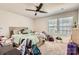 This bedroom features a ceiling fan, natural light, and is ready to be personalized at 120 Hornbeam Ln, Mooresville, NC 28117