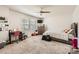 Bright bedroom features a ceiling fan, natural light, and space for personalization at 120 Hornbeam Ln, Mooresville, NC 28117