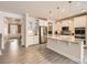 Stylish kitchen with white cabinets, granite countertops, and stainless steel appliances at 120 Hornbeam Ln, Mooresville, NC 28117