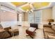 Traditional living room with hardwood floors, decorative ceiling, and chandelier at 120 Hornbeam Ln, Mooresville, NC 28117