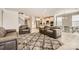 Inviting open-concept living space with a modern staircase and connection to kitchen and dining at 120 Hornbeam Ln, Mooresville, NC 28117