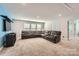 Spacious living room with a large sectional sofa, perfect for entertaining at 120 Hornbeam Ln, Mooresville, NC 28117