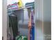 Walk-in closet with hanging clothes and shelving for storage at 1216 Center St, Wadesboro, NC 28170
