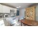 Functional kitchen with white cabinets, modern appliances, and plenty of counter space at 1216 Center St, Wadesboro, NC 28170