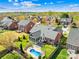 A beautiful backyard featuring an in-ground pool and screened-in porch at 127 Oxford Dr, Mooresville, NC 28115