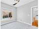 Bright bedroom with a view of the pool, neutral walls, plush carpet and a ceiling fan at 127 Oxford Dr, Mooresville, NC 28115