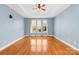 Empty bedroom showcasing hardwood floors, neutral paint, and natural light at 127 Oxford Dr, Mooresville, NC 28115