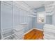 Walk-in closet with custom shelving, providing ample storage space at 127 Oxford Dr, Mooresville, NC 28115