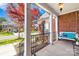 A cozy front porch with a swing offers a relaxing spot to enjoy the neighborhood views at 127 Oxford Dr, Mooresville, NC 28115