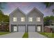 Charming newly built townhomes with individual garages and front entrances nestled in a cozy neighborhood at 1322 Condon St, Charlotte, NC 28216