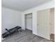 Bedroom with closet and open door at 1327 Santee St, Charlotte, NC 28208