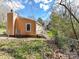 Exterior of home with small deck and chain link fence at 1327 Santee St, Charlotte, NC 28208