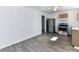 Sunlit kitchen with stainless steel refrigerator and range appliances at 1327 Santee St, Charlotte, NC 28208