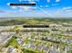This is an aerial view of a neighborhood and home that is located a short drive to the Charlotte Motor Speedway at 13514 Porter Creek Rd, Charlotte, NC 28262