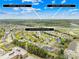 This is an aerial view of a neighborhood and home that is located a short drive to UNC Charlotte and Uptown Charlotte at 13514 Porter Creek Rd, Charlotte, NC 28262