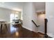 Open-concept dining area showcasing modern chandelier and sliding doors to the backyard at 1814 Shumard Ln, Charlotte, NC 28205