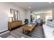 Contemporary living room with an open layout flowing to the kitchen and dining at 1814 Shumard Ln, Charlotte, NC 28205