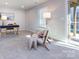 Stylish home office with a modern desk, neutral walls, and natural light at 1814 Shumard Ln, Charlotte, NC 28205
