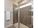 This shower features modern tile, a glass enclosure, and chrome hardware at 1814 Shumard Ln, Charlotte, NC 28205