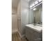 Modern bathroom with a gray vanity, framed mirror, and walk-in shower, creating a functional and stylish space at 18840 Nautical Dr # 57, Cornelius, NC 28031