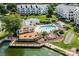 Gorgeous view of clubhouse and pool area with patio and landscaping at 18840 Nautical Dr # 57, Cornelius, NC 28031