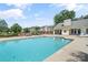 Sparkling swimming pool with patio, lounge seating, and nearby clubhouse at 18840 Nautical Dr # 57, Cornelius, NC 28031