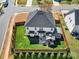 Aerial view of a fenced backyard, patio with gazebo, shed, and well-kept lawn at 311 Glenn Allen Rd, Mooresville, NC 28115
