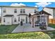 A spacious backyard with a large patio area, gazebo, and lush green lawn at 311 Glenn Allen Rd, Mooresville, NC 28115