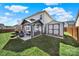 Backyard featuring a large patio with a gazebo, outdoor shed, and well-manicured lawn at 311 Glenn Allen Rd, Mooresville, NC 28115
