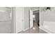 Bright bathroom with a walk-in shower and a view to the bedroom, blending convenience and comfort at 311 Glenn Allen Rd, Mooresville, NC 28115