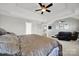 A glimpse of the main bedroom leading to a sitting area, offering a comfortable and inviting space at 311 Glenn Allen Rd, Mooresville, NC 28115